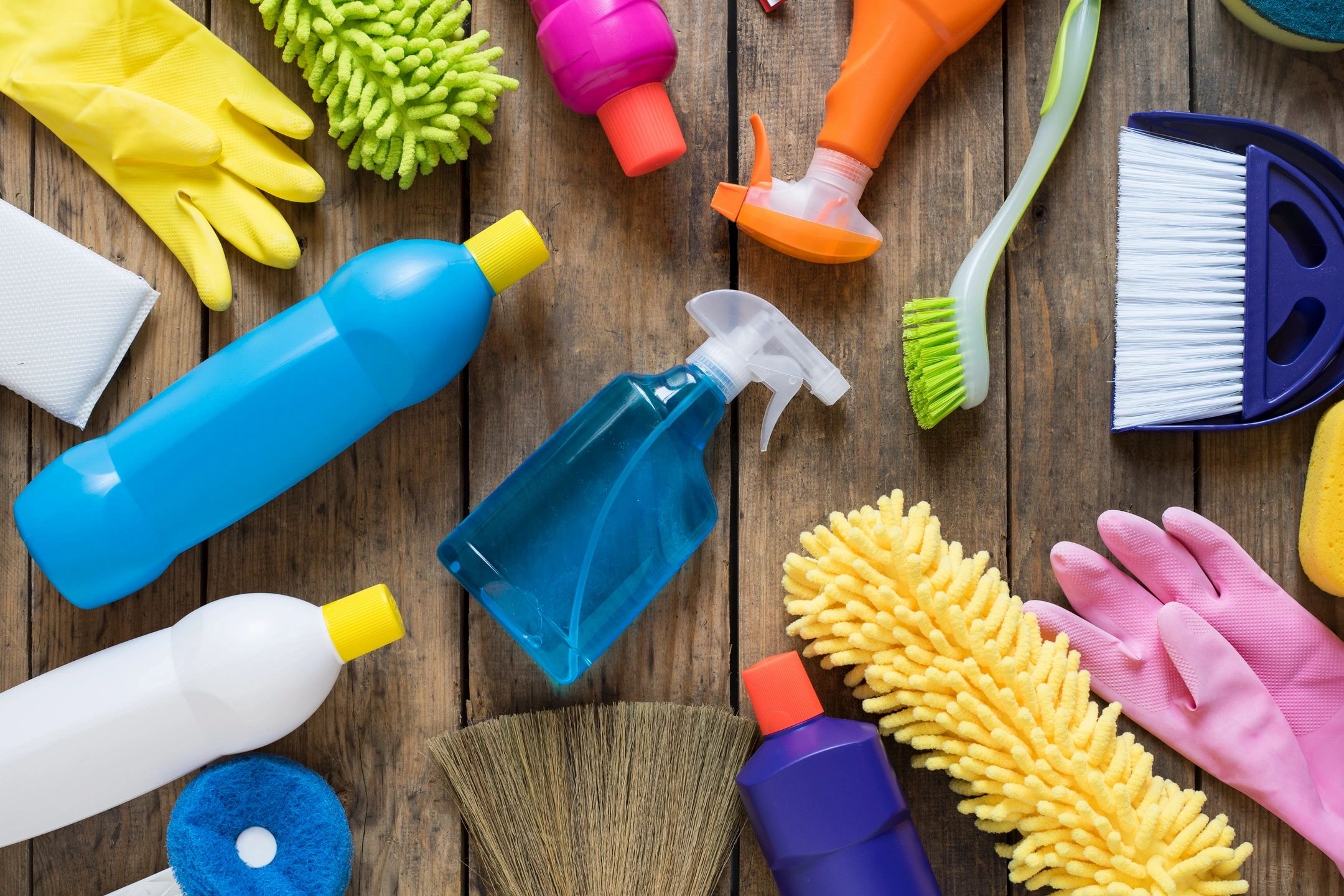 colorful bottles and sprayers seen from above