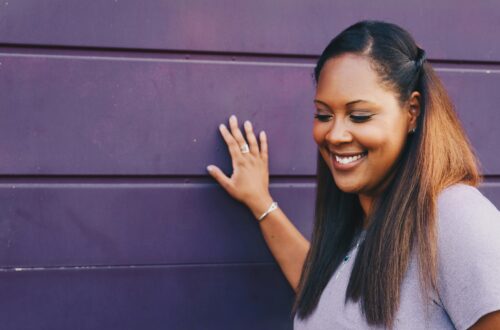 Image of African American women with straight, long hair.