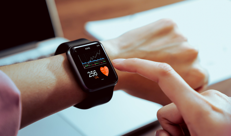 Images of a smart phone, smart watch, yellow and black medicine capsules, and a commercial aircraft sitting on a runway.